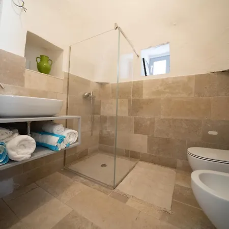 Trullo Lis Con Piscina Privata 圣米凯莱萨伦蒂诺